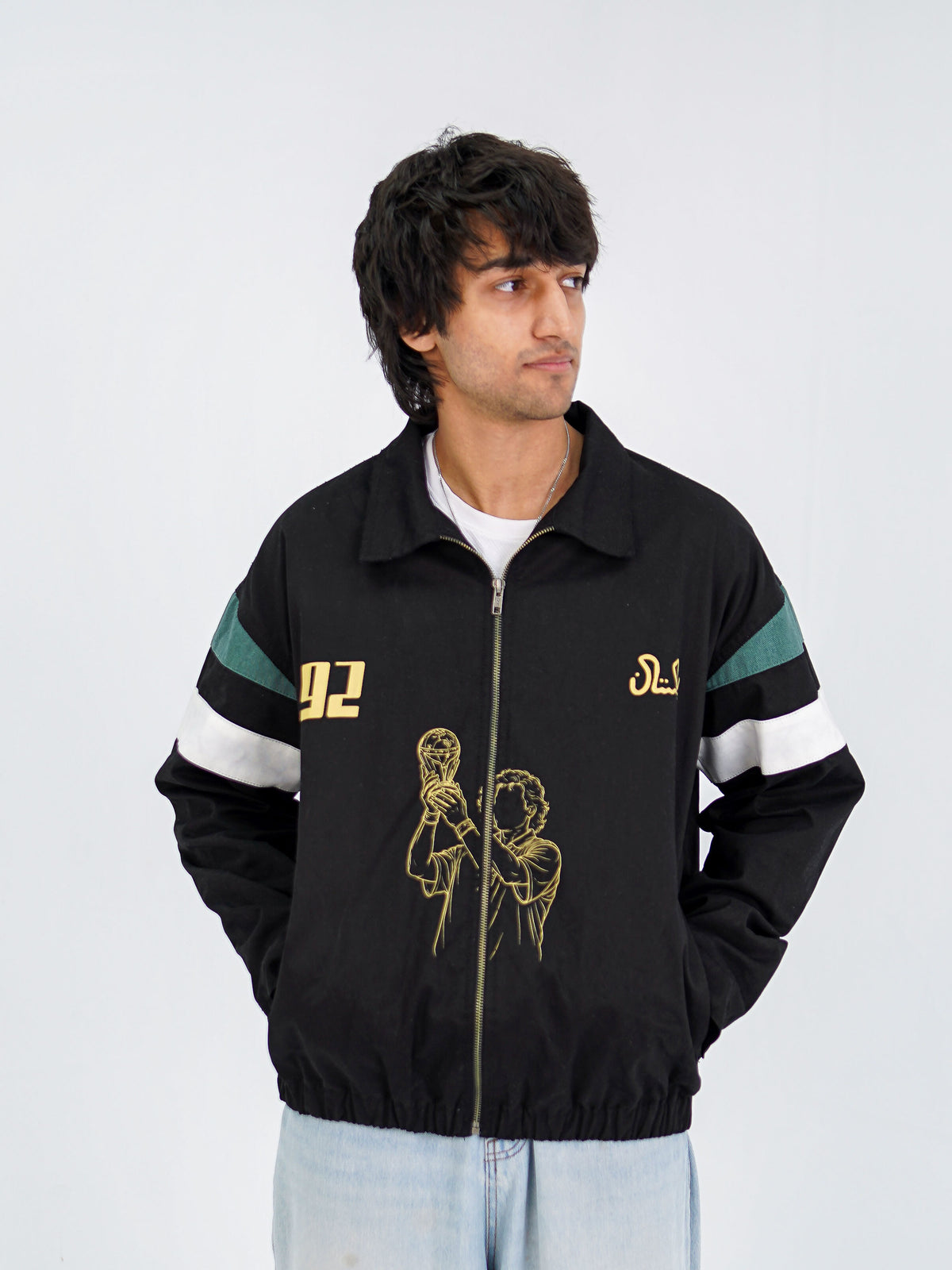 Cornered Tigers '92 jacket back — 'You only lose when you give up' and Pakistani street cricket illustration